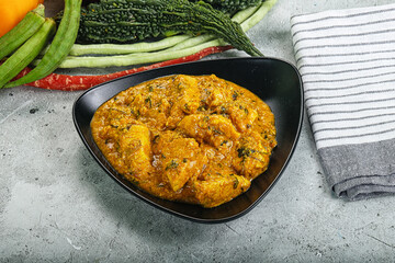 Spicy chicken masala in the bowl