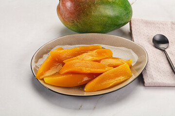 Canned mango slices in the bowl