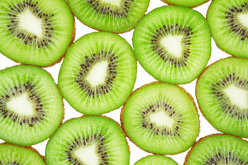 Fototapeta premium pattern of many kiwi slices filling the frame isolated transparent