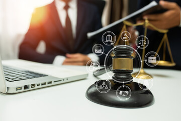 team meeting.businessman discussing legal legislation at law firm. judge gavel 