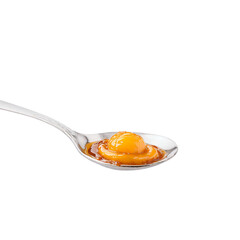 Apricot jam swirl golden and glossy twirling off a spoon with apricot halves tumbling Food