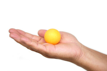 Hand holding orange table tennis ball or Ping pong ball, isolated on white background. concept, sport equipment. Exercise and workout tool. Competitive game sport.       