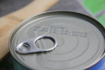 expire date on food can on white background ,