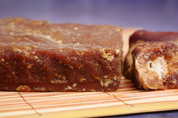  Jaggery traditional cane sugar cube on table 