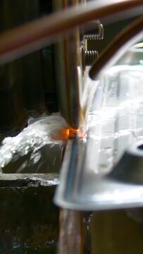 Manufacturing radiators for electric heaters and oil heaters. Manufacturing oil heaters. Vertical video.