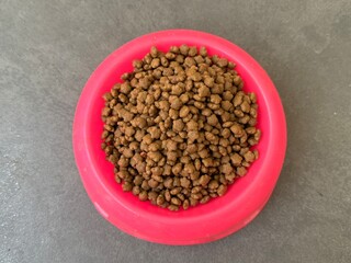cat food put in a pink container