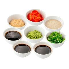 various sauces for sushi rolls on a white background