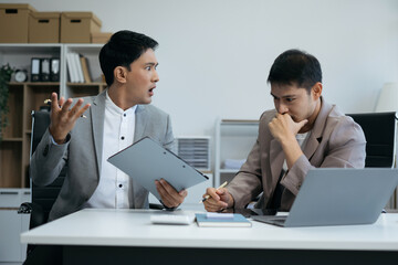 Business people, business team are under stress from working for poor work.