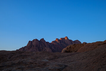 The Spitzkoppe  is a group of bald granite peaks or inselbergs located between Usakos and Swakopmund in Namib desert I Namibia, sunset photo
