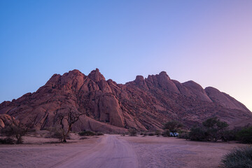 The Spitzkoppe  is a group of bald granite peaks or inselbergs located between Usakos and Swakopmund in Namib desert I Namibia, sunset photo