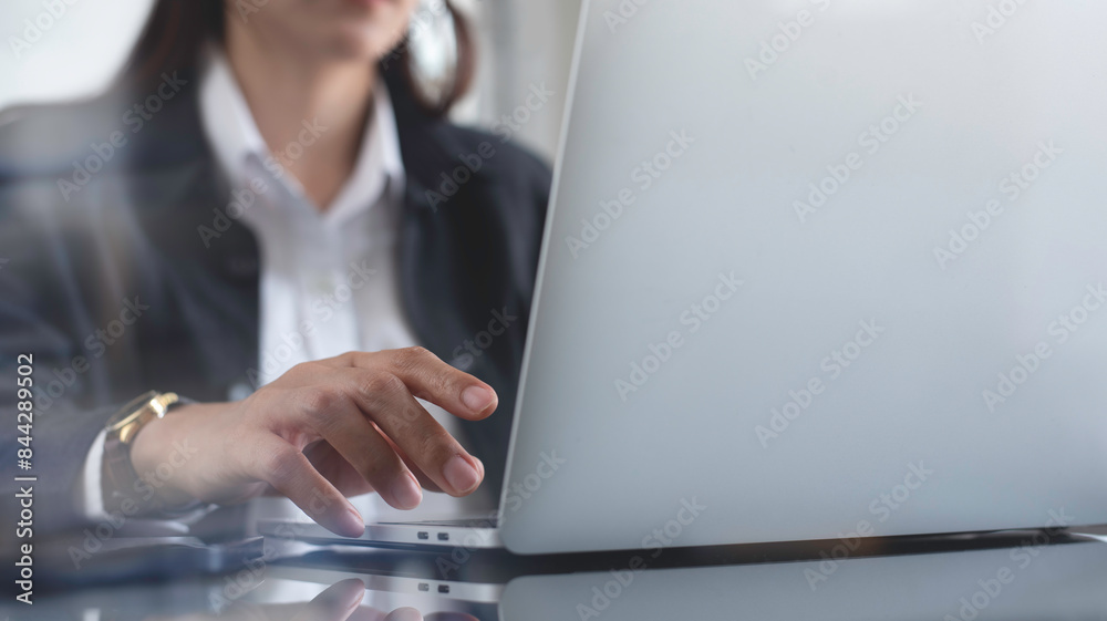 Canvas Prints business woman searching the information, surfing the internet on laptop computer at office, close u