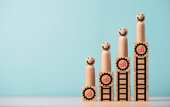 Businessman figure standing on the top of technical gear and increasing graph for human development and continuous improvement concept.