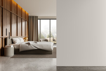 Modern bedroom with a large bed, wood paneling, and a window, light. Empty wall on the right, home...