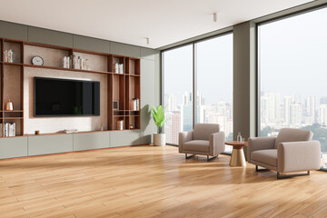 Cozy home living room interior with armchairs and tv display, panoramic window