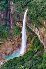 Cherrapunji, one of the wettest places on earth, is home to the stunning Nohkalikai Falls. The Nohkalikai Falls is the tallest plunge waterfall in India.
