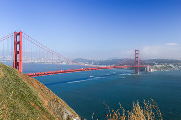 Fototapeta premium The Golden Gate Bridge taken from the Marin County side. San Francisco skyline in the background. California.