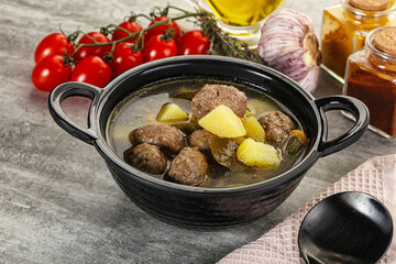 Soup with meatball and potato