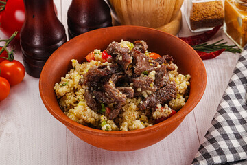 Traditional couscous with beef and vegetables