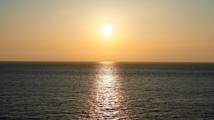 Naklejka premium 沖縄県慶良間諸島阿嘉島の新城展望台から見た夕焼け