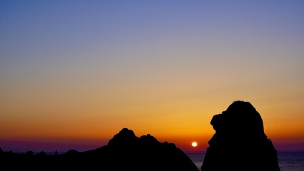 壱岐島のシンボルである猿岩の夕焼けの風景