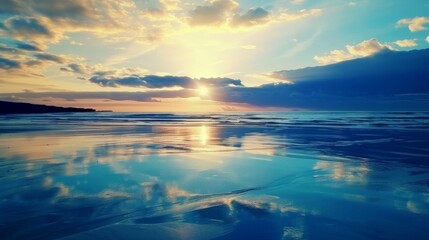 Beach Sunset With Blue Sky and Calm Waters