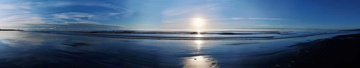 Fototapeta premium Beach Sunset With Blue Sky and Calm Ocean Waves