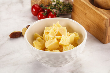 Crushed parmesan cheese in the bowl