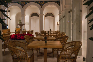 an elegant restaurant hall with a fountain
