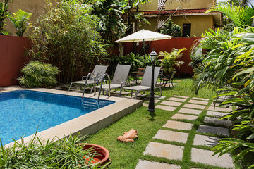 View of the villa buildings in a picturesque area near Sinquerim beach. Sinquerim, Candolim, GOA, INDIA.