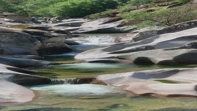 Los Pilones, natural pools in the Jerte Valley, in the Garganta de los Infiernos. The water moves from one pylon to another through small waterfalls, adding dynamism to the scene. C&aacute;ceres, Spain