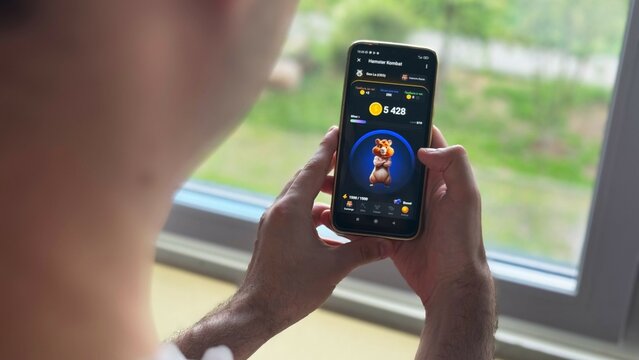 Hamster Kombat telegram bot on smartphone screen. Moscow. Russian Federation . June 9, 2024