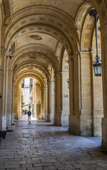 Tipical street of La Valletta with wooden terraces in Malta.