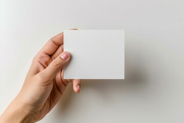 Obraz premium Blank White Card Mockup on Hand created with Generative AI