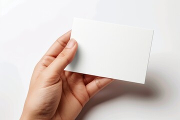 Obraz premium Blank White Card Mockup on Hand created with Generative AI