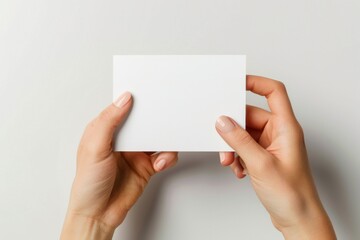 Fototapeta premium Blank White Card Mockup on Hand created with Generative AI