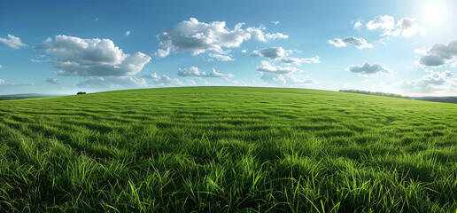 Fototapeta premium Nature landscape with green meadows, blue sky with clouds and mountains in the background. classic green landscape, Generative AI