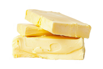 Three slices of yellow butter stacked on top of each other
