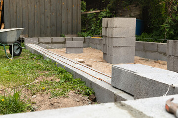 The foundations of a house made of expanded clay blocks, the frame of a new house in the process of construction