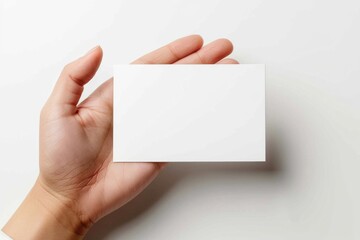 Fototapeta premium Blank White Card Mockup on Hand created with Generative AI