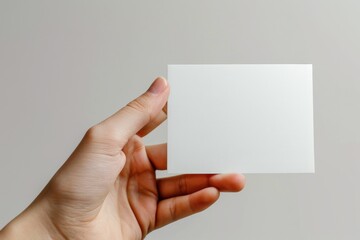 Fototapeta premium Blank White Card Mockup on Hand created with Generative AI