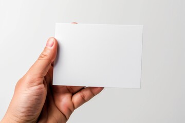 Obraz premium Blank White Card Mockup on Hand created with Generative AI
