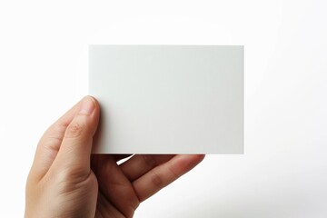 Obraz premium Blank White Card Mockup on Hand created with Generative AI