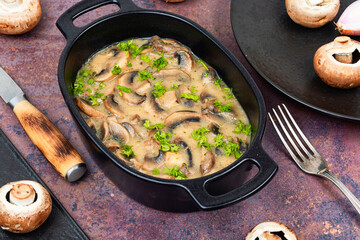 Mushrooms in creamy sauce.