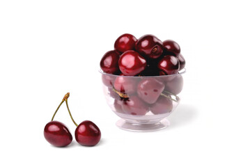 Ripe natural cherries, sweet cherries in a glass bowl on a white background,  selective focus