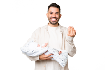 Young caucasian father with her newborn baby over isolated background inviting to come with hand. Happy that you came