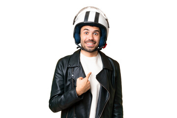 Young caucasian man with a motorcycle helmet over isolated chroma key background with surprise facial expression