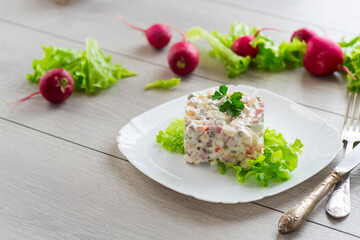 vegetable salad with boiled vegetables and dressed with mayonnaise