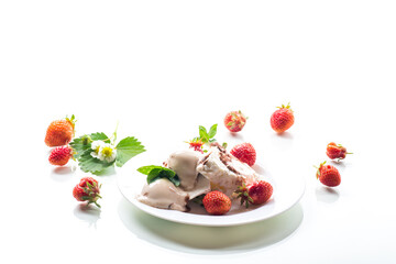 fresh organic cottage cheese with strawberries and ice cream in a plate