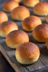 Freshly baked buns with a golden crust.