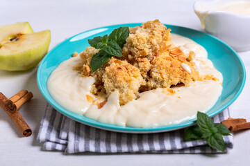 Apple crumble with custard.